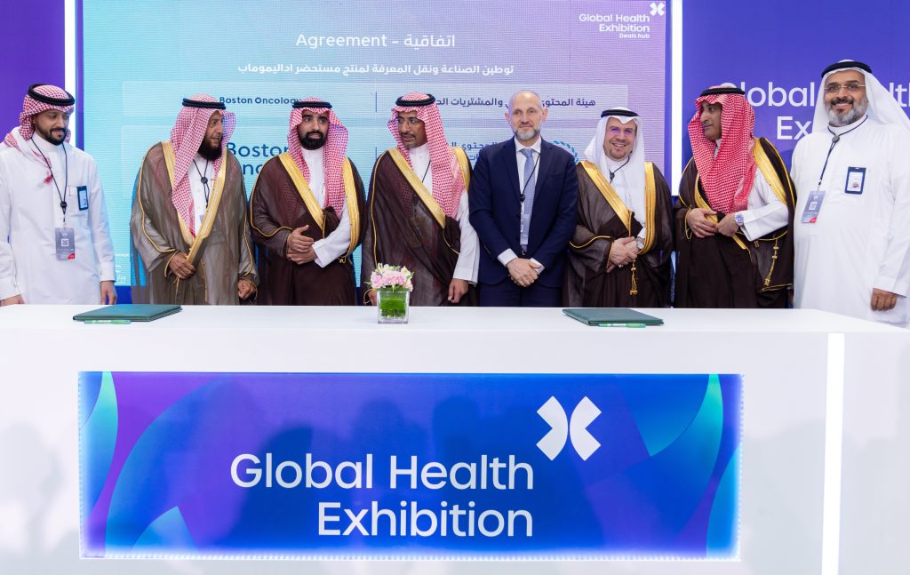 Representatives from the Local Content & Government Procurement Authority (LCGPA) and Boston Oncology Arabia at the Global Health Exhibition 2025 in Riyadh, following the signing of an agreement to localize the manufacturing of advanced biologic medicines.